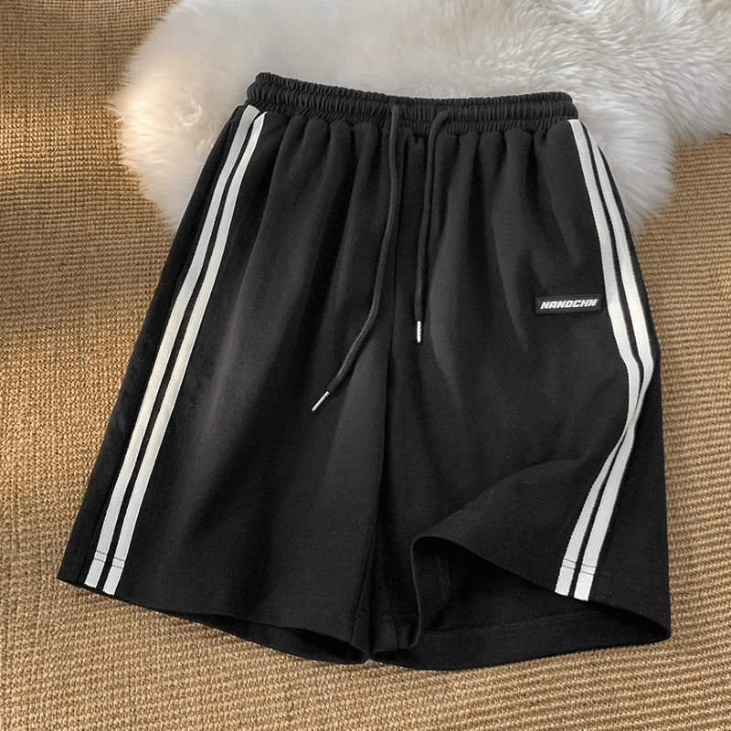 Wide sport casual women's shorts with elastic waistband, black with white stripes, perfect for athletes seeking comfort and style, product code SF0195.